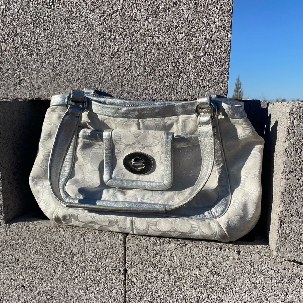 White and silver coach purse